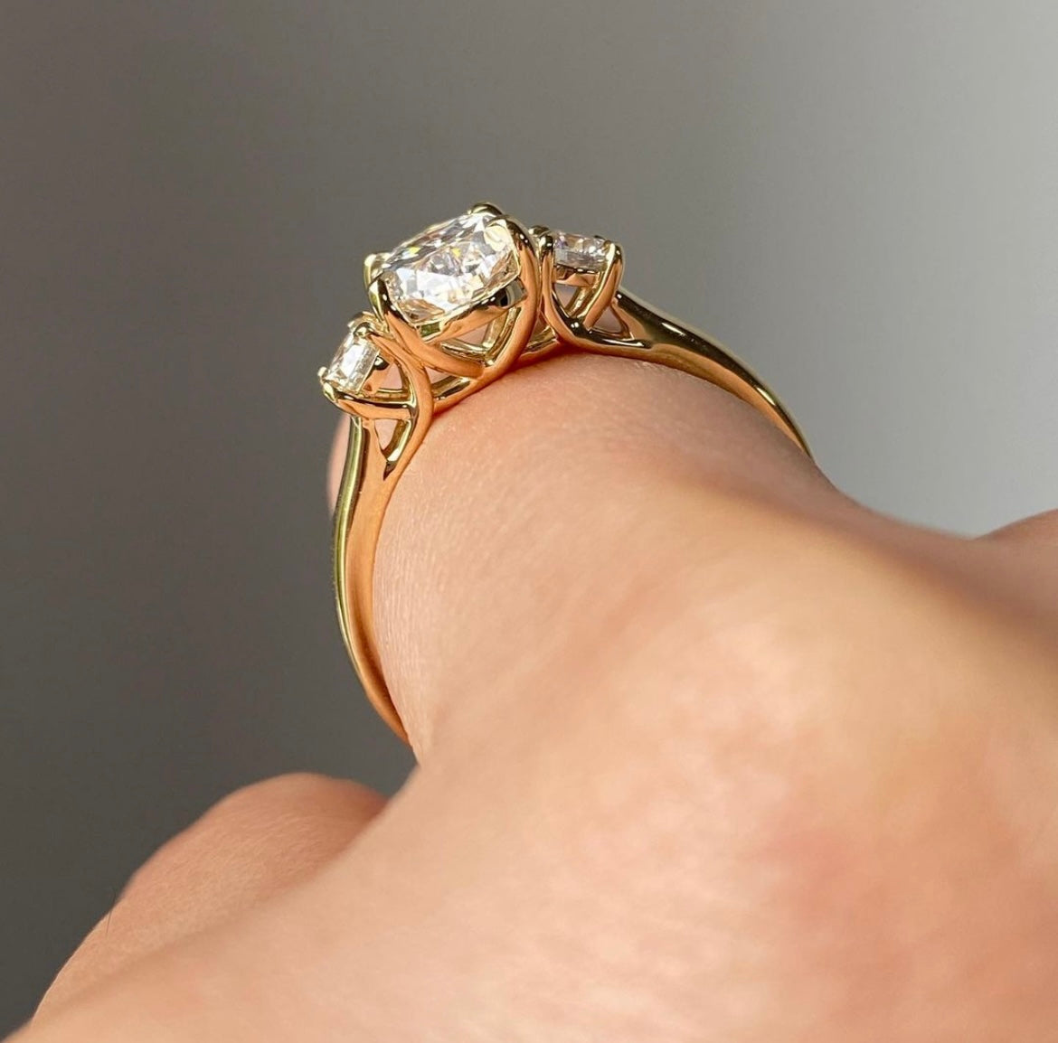 3 Carat Oval with 50 Cent Round on sides on 14Kt Hallmarked Gold