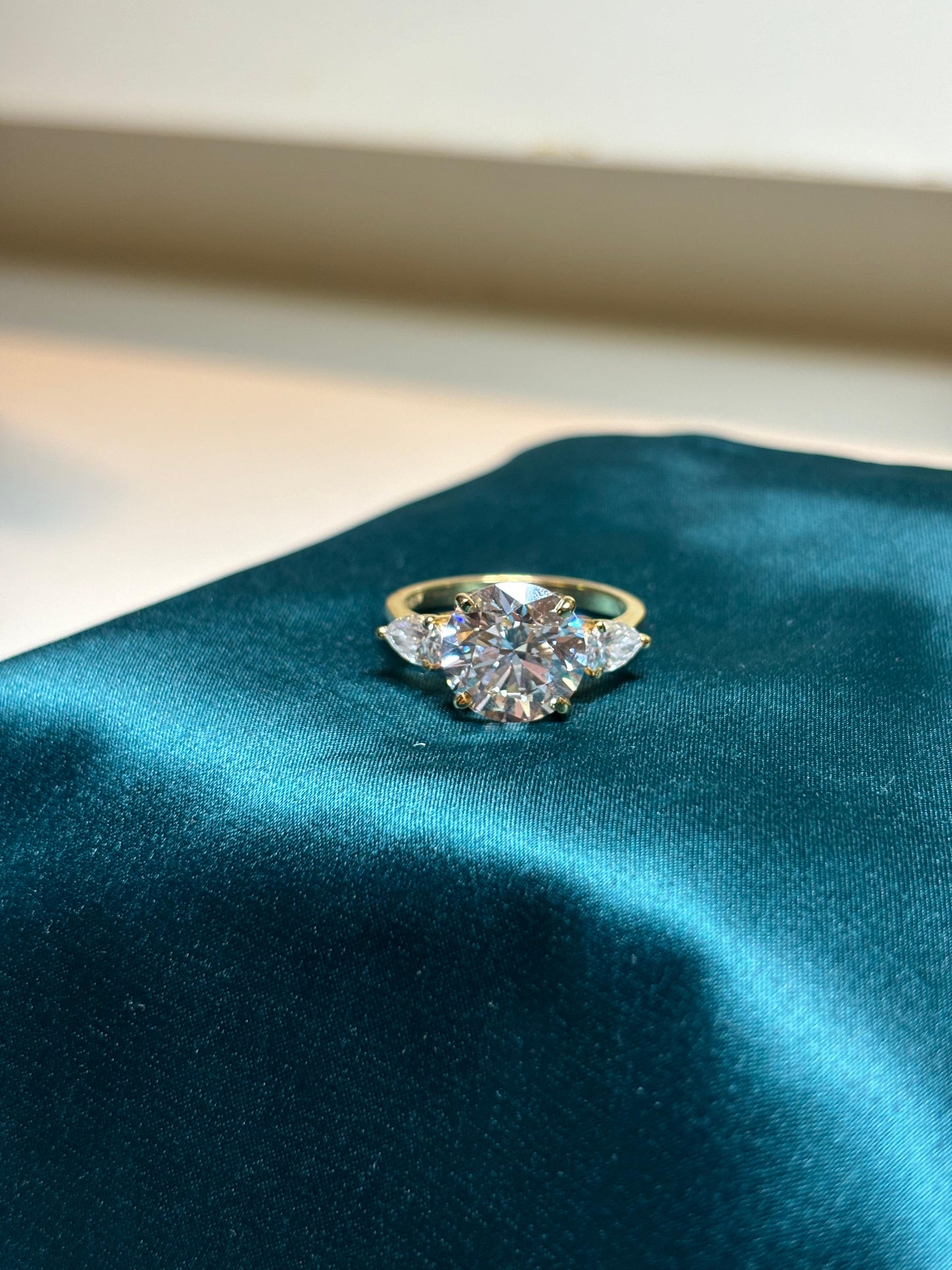 5 Carat Lab Grown Diamond with 50 Cent Each Pear on Sides on 18Kt Hallmarked Gold
