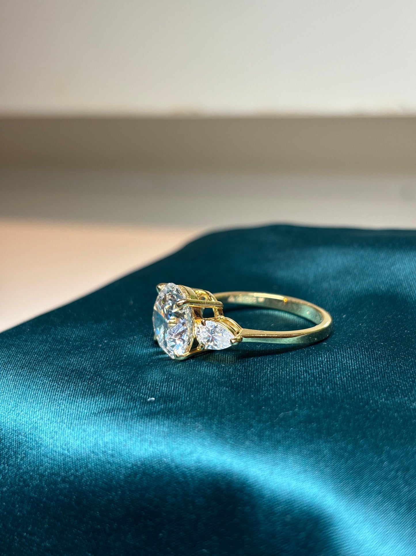 5 Carat Lab Grown Diamond with 50 Cent Each Pear on Sides on 18Kt Hallmarked Gold