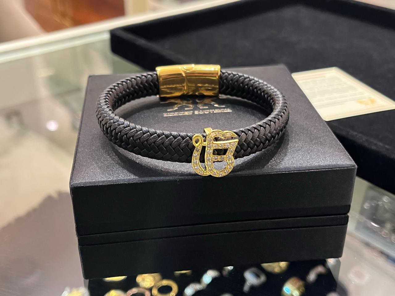 Ekonkar 18Kt Hallmarked Gold with Certified Diamonds on BlackBrown Cord