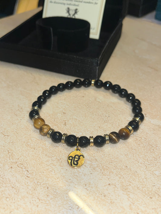 24Kt Gold Plated Ekonkar Tag Bracelet on Black Agate and Tiger Stone beads. LSO EXCLUSIVE
