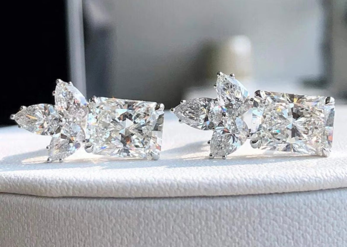 3 Carat Each Radiant Cut Lab Grown Diamond with supporting 50 cent each pear