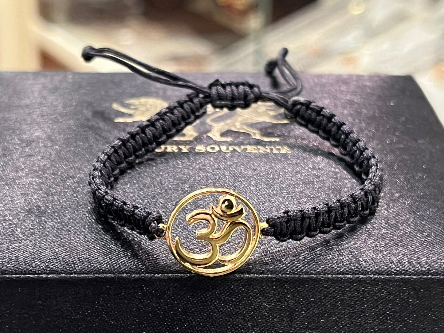 OM Bracelet Wrist Jewel in Black Adjustable Thread ( 24Kt Gold Plated )