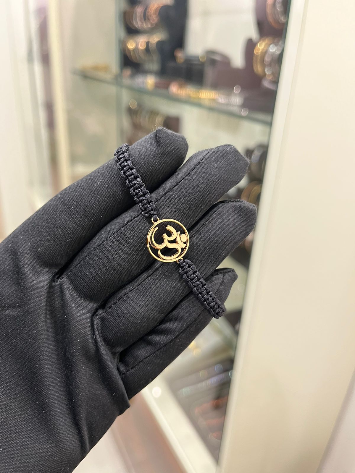OM Bracelet Wrist Jewel in Black Adjustable Thread ( 24Kt Gold Plated )